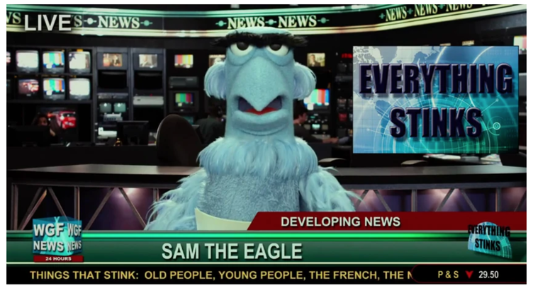 Sam the Eagle Muppet as News Anchor. An example of how to play with your powerful chyron!