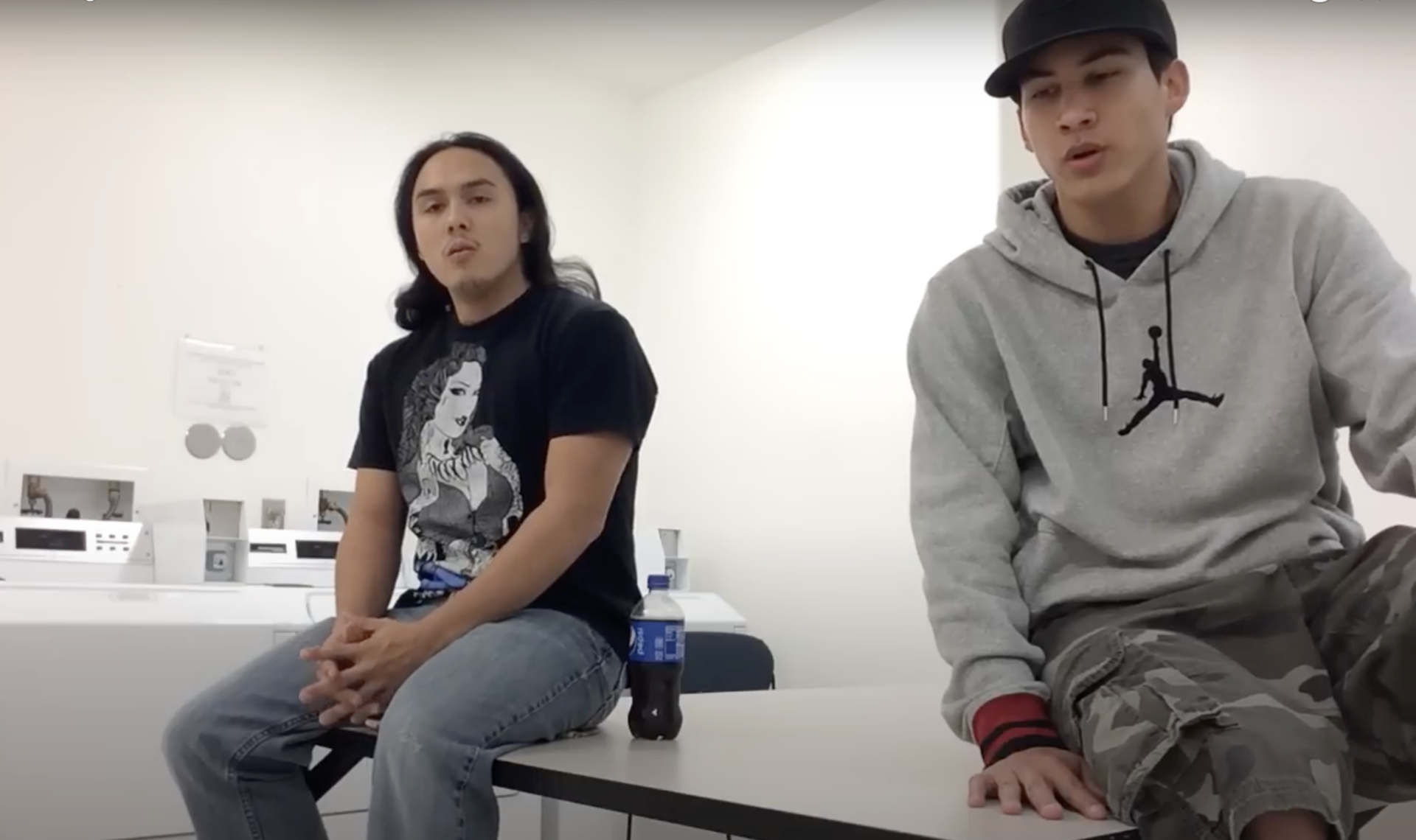 Two Lakota youth singing a gratitude song