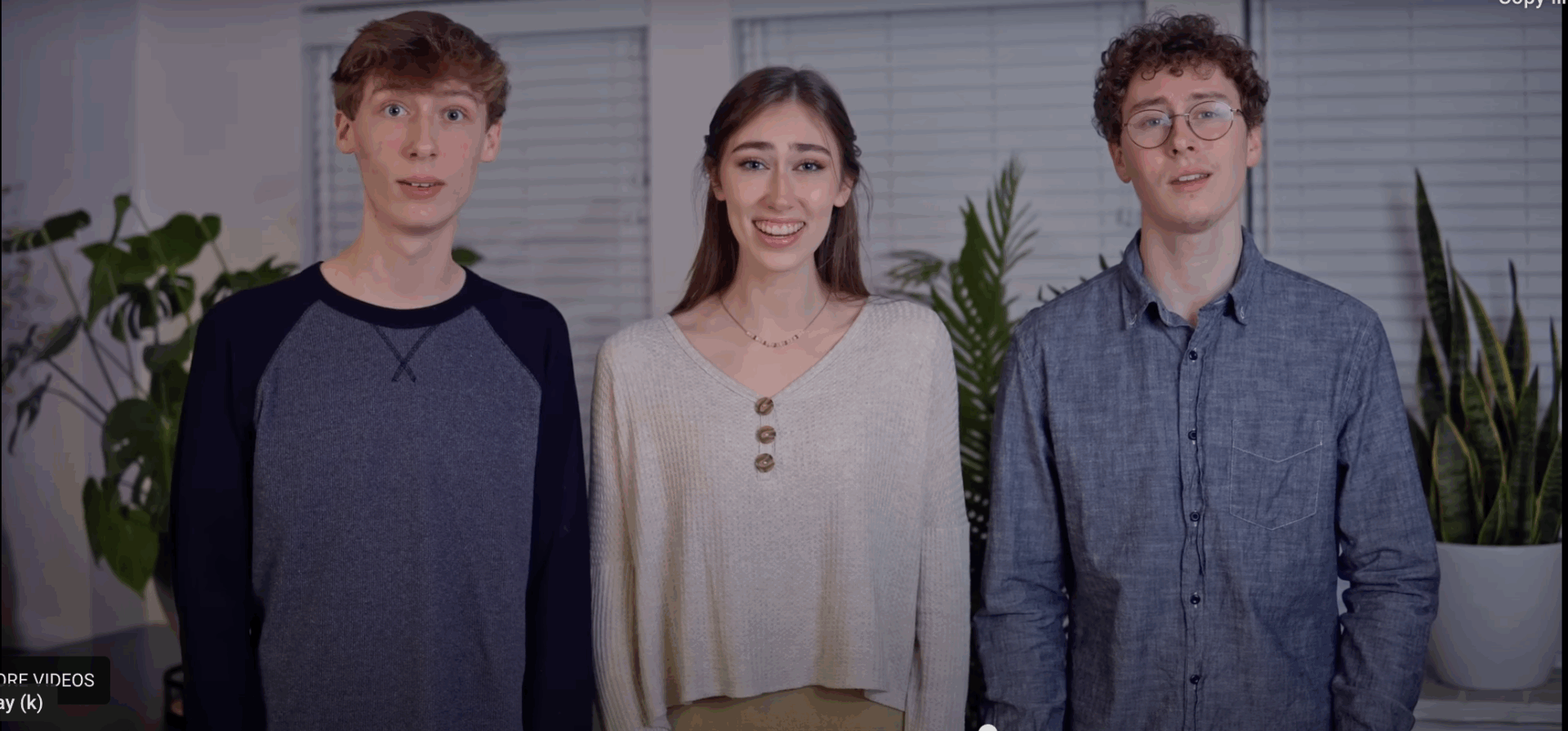 Three teen siblings singing in harmony